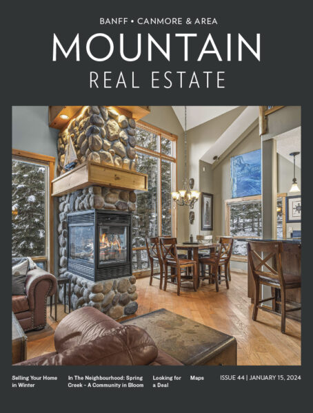 Cover of the January 2024 issue of Mountain Real Estate magazine features the interior of a home.